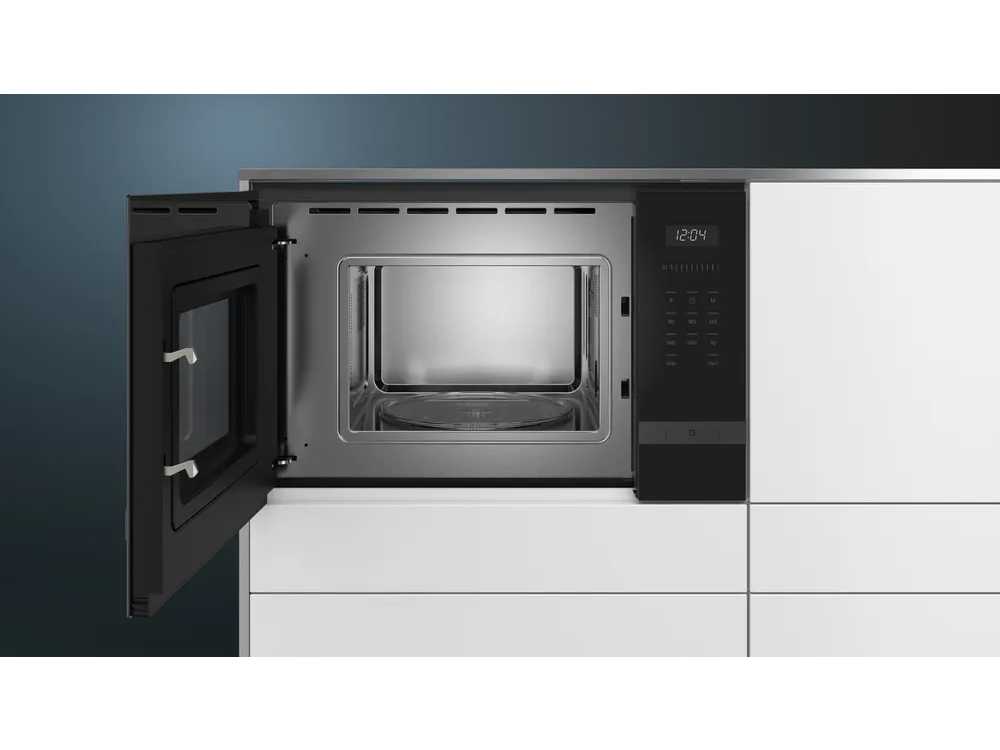 Häcker Concept130  Bali Notenhout  Topsoft mat lak zwart eiland keuken - Häcker Concept130 Keukens keukens | afbeelding 30 van 40