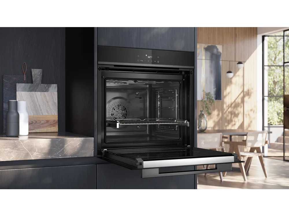 Häcker Concept130  Bali Notenhout  Topsoft mat lak zwart eiland keuken - Häcker Concept130 Keukens keukens | afbeelding 33 van 40